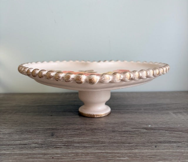 Decorative ceramic pedestal dish with decorative rim 