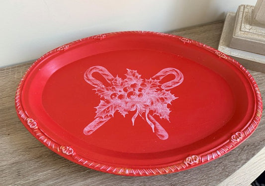 Red tray with white floral candy cane design