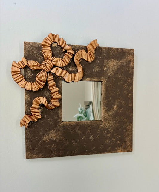 Decorative mirror with bow detail