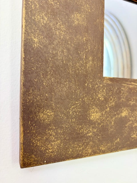 Close-up of a textured mirror corner