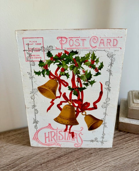 Vintage-style Christmas wood  postcard with bells and holly 