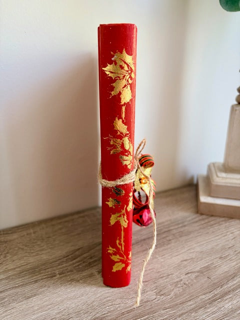 Red book with gold designs 