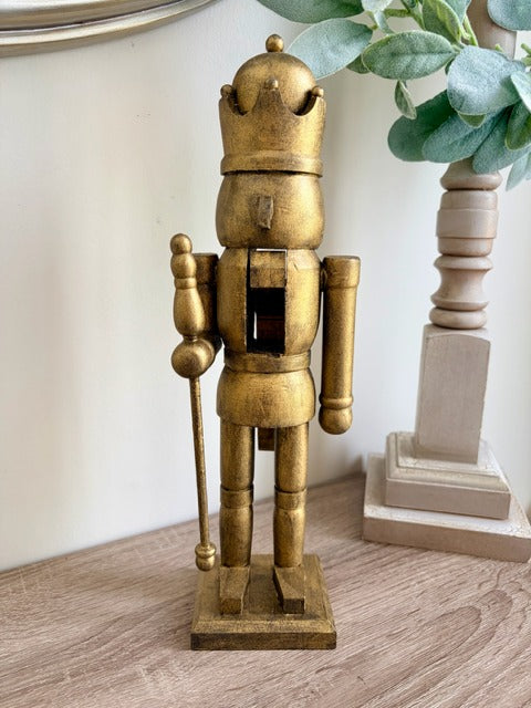 Gold nutcracker figurine 
