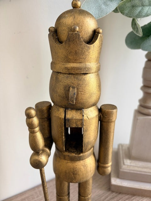 Gold nutcracker figure 