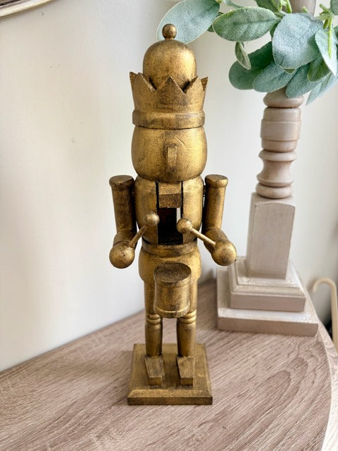 Gold nutcracker figurine 