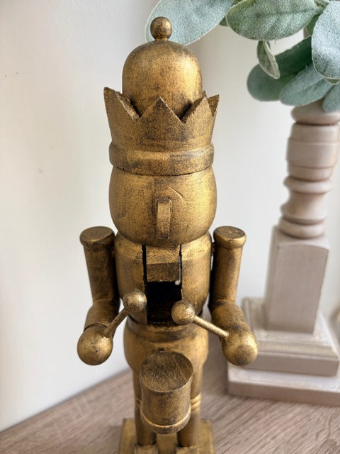 Gold nutcracker figurine