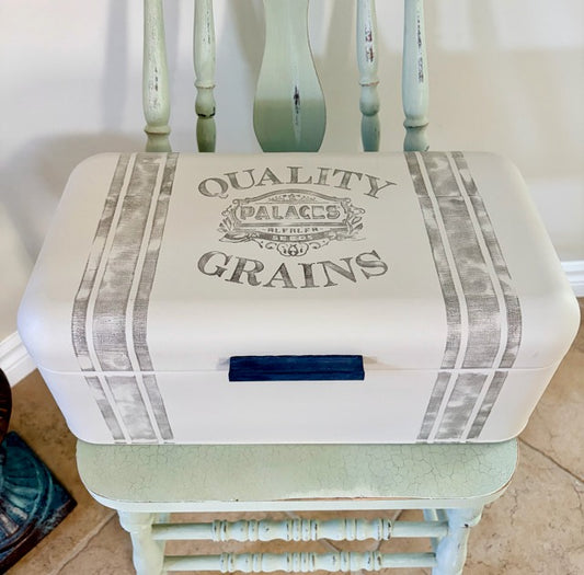 Bread box with 'Quality Grains' design 