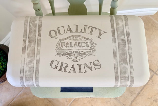 Vintage-style breadbox labeled 'Quality Grains' 