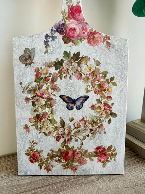 Close up of flowers and butterflies.