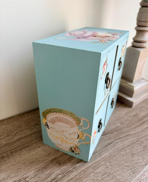 Side view of stacked teacup transfer.