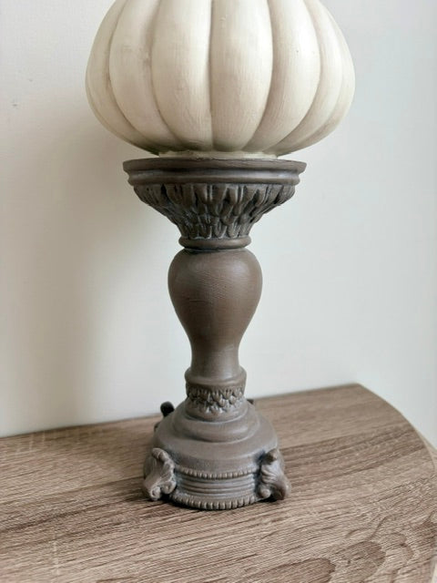 Close up of ornate brown candleholder