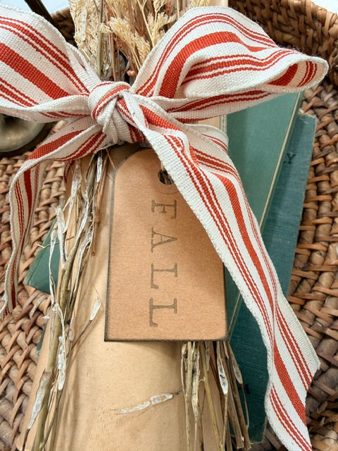 Close up of "fall" tag and striped bow.