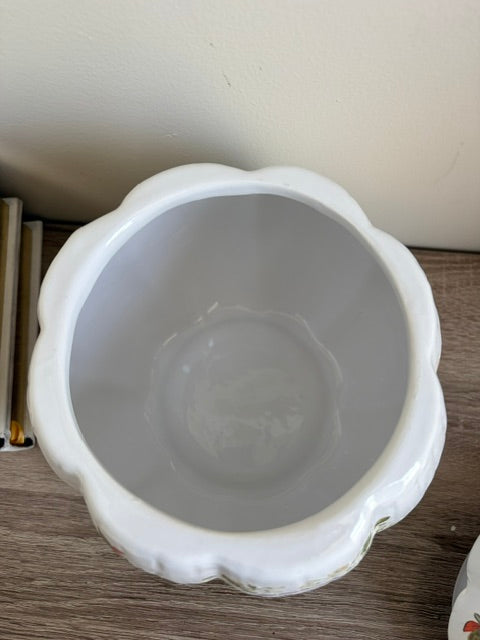 Interior of a white ceramic pumpkin.
