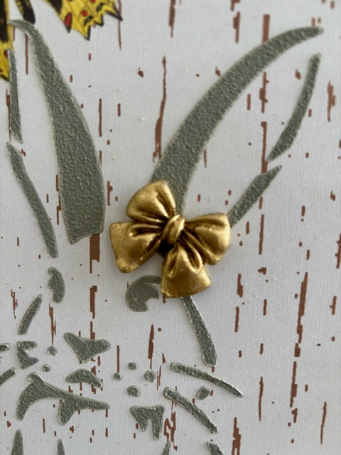 Decorative wooden sign with butterfly and floral design 