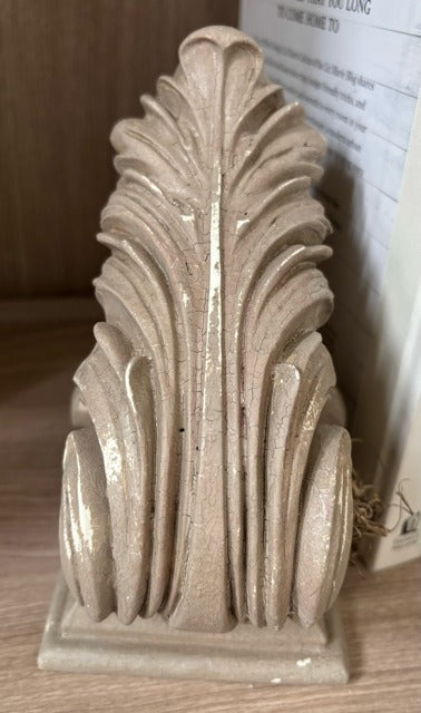 Painted corbel with a nest, bird and eggs