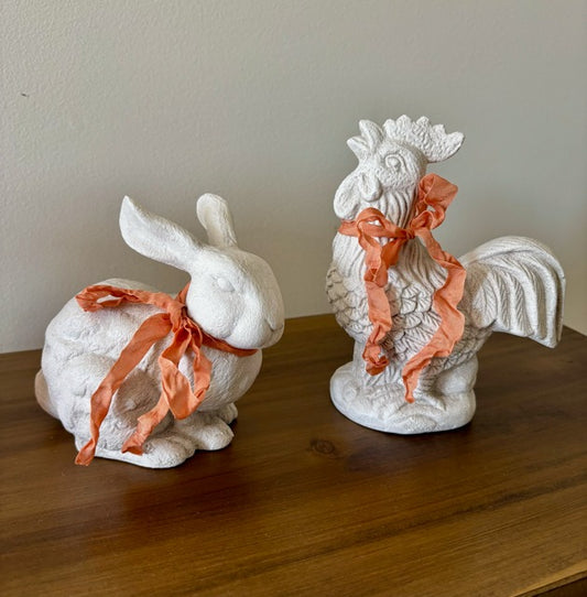 Decorative ceramic rabbit and rooster with peach ribbons 
