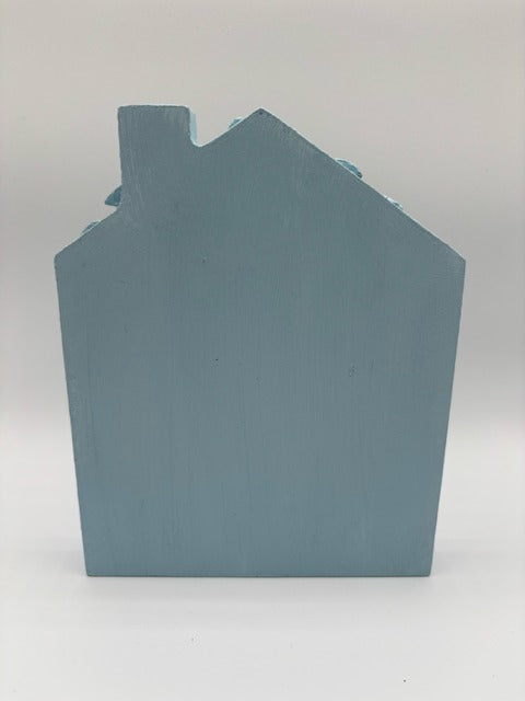 Decorative blue house with a rabbit illustration 