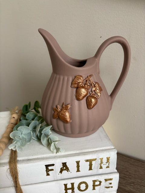 Pink ceramic pitcher with clay rose gold strawberries