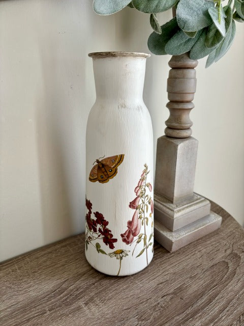 Decorative vase with floral and dragonfly design 