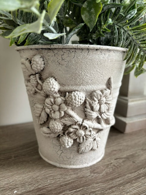 Metal pot with clay berry design and faux greenery