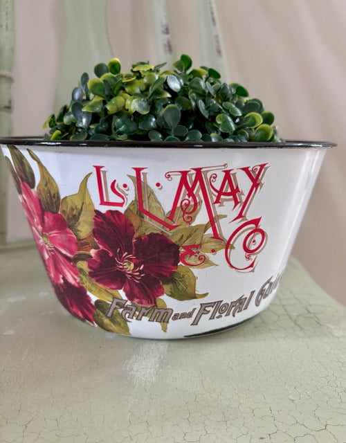 Decorative bowl with green topiary ball