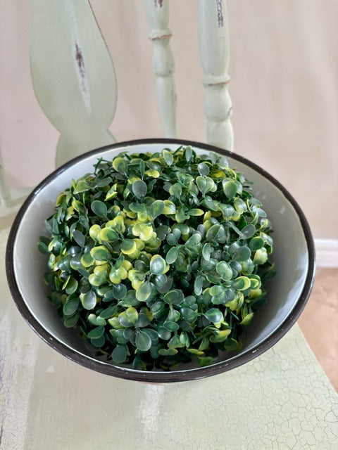 Decorative bowl with green topiary ball