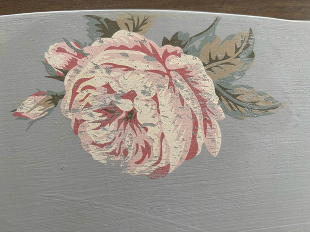 Decorative floral design on a textured surface