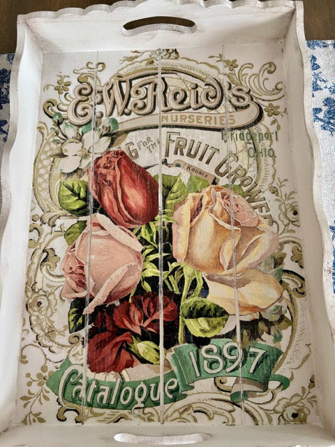 Decorative tray with floral design and text 