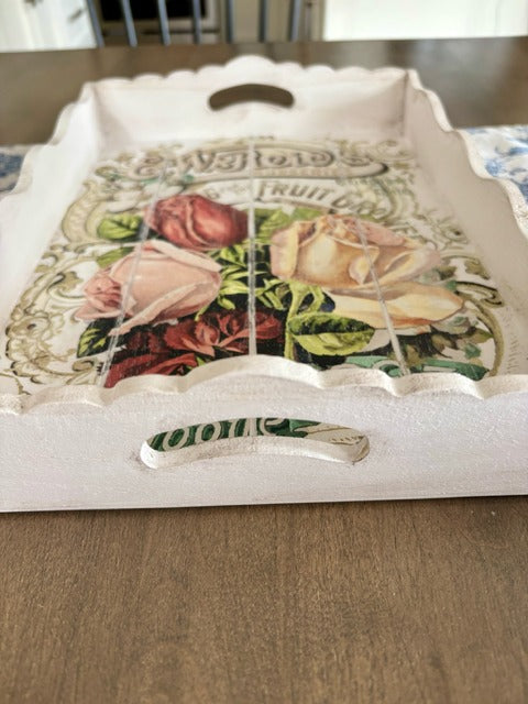 Decorative tray with floral design and text 