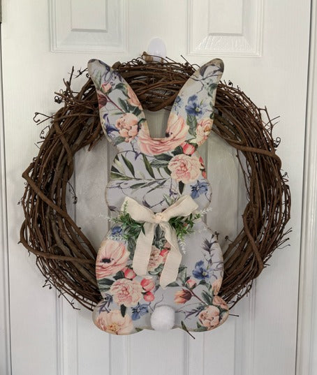 Decorative wreath with floral bunny.