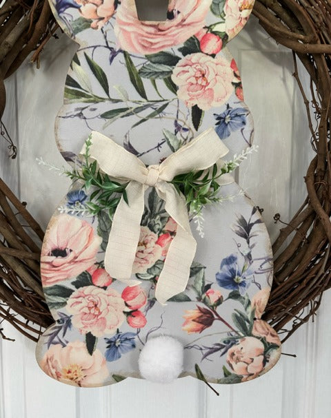 Decorative wreath with floral bunny.