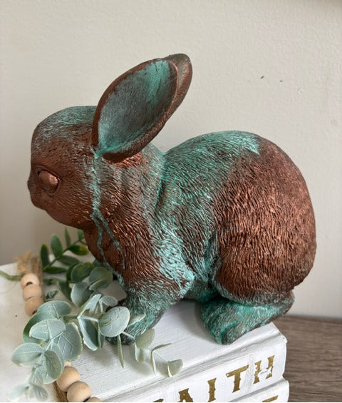 Bunny figurine painted in bronze paint with green patina