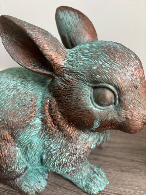 Bunny figurine painted in bronze paint with green patina