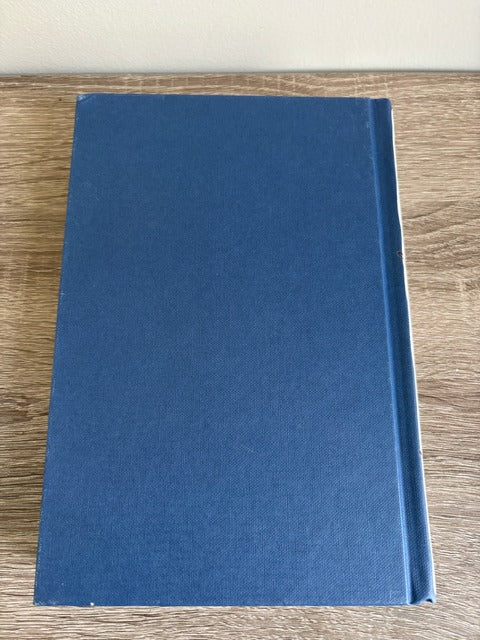 Blue book on a wooden surface