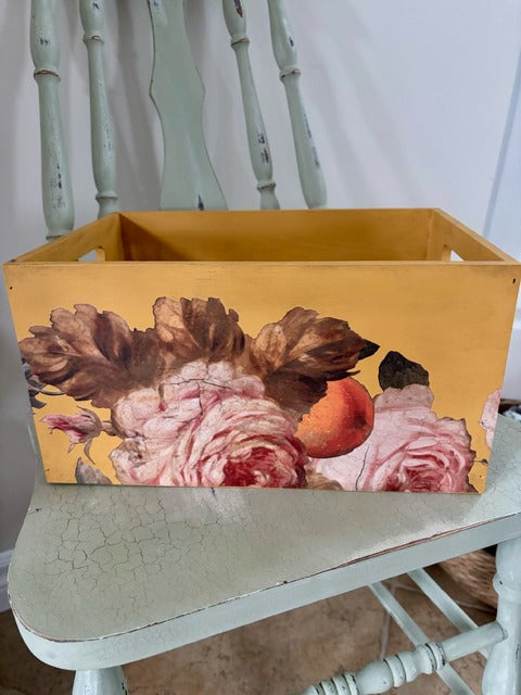 Yellow wooden crate with floral design 