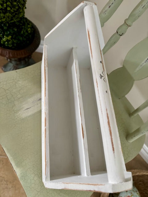 White wooden toolbox with a distressed finish 