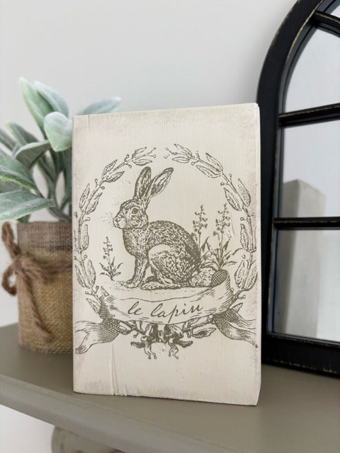 Vintage bunny image on a wood block.