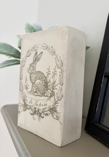 Vintage bunny image on a wood block.
