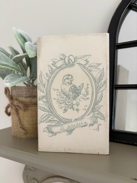 Vintage chick image on a wood block.