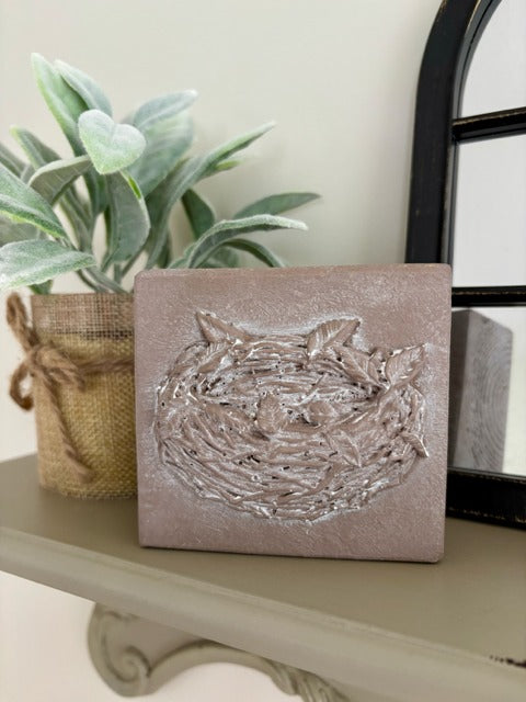 Wood block with clay nest